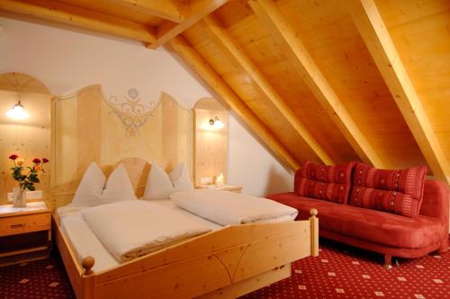 เตียงในห้องที่ Appartments Jägerhof