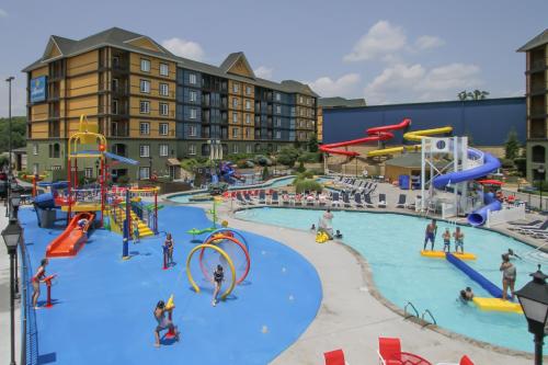 a large water park with people playing in it at The Resort at Governor's Crossing in Pigeon Forge