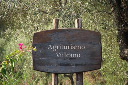 a wooden sign with the words autoimmune villema at Agriturismo Vulcano in Mirto Crosia