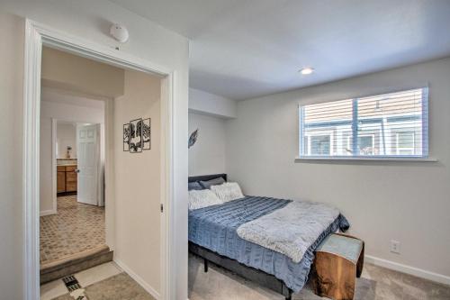a bedroom with a bed and a window at Convenient Burien Getaway 12 Mi to Dtwn SEA! in Burien