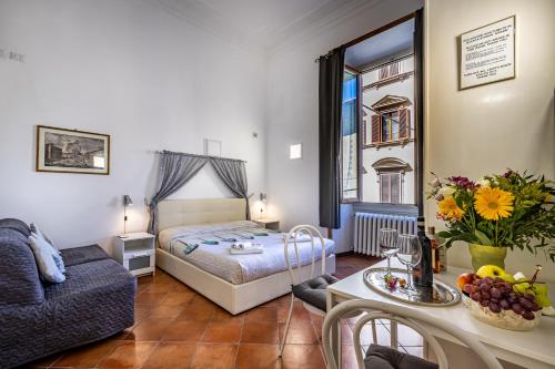 Postel nebo postele na pokoji v ubytování Duomo Palace