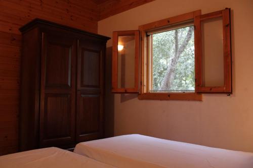 Ένα ή περισσότερα κρεβάτια σε δωμάτιο στο Agriturismo Tenuta Frassanito