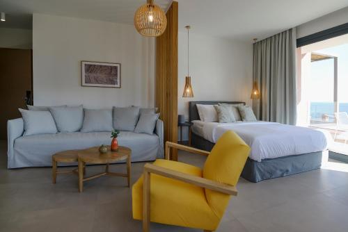 Postel nebo postele na pokoji v ubytování MARAVILLA SUITES