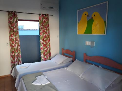 Кровать или кровати в номере Pousada Bela Paraty