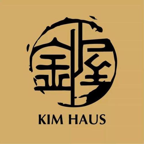 a logo for a kim haus company at Kim Haus Loft in George Town