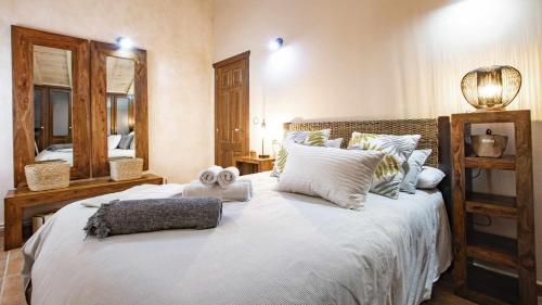 Giường trong phòng chung tại Atico con vistas en Albentosa La Torre