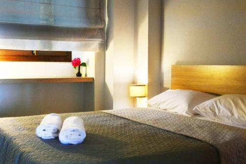 En eller flere senge i et værelse på Amazing beach house