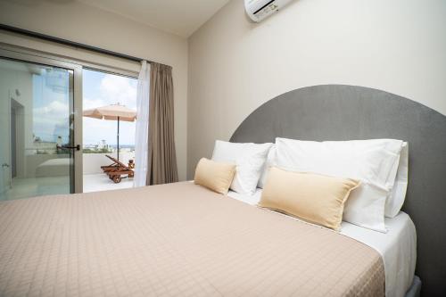 Katil atau katil-katil dalam bilik di Villa Oliveto