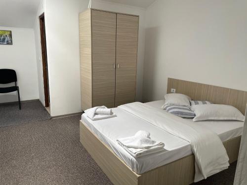 Postel nebo postele na pokoji v ubytování Resort SPA Clisura Dunarii