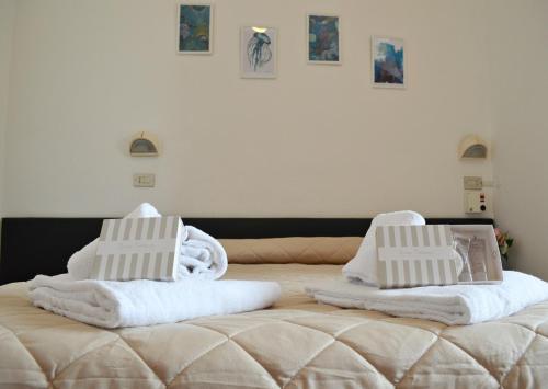 Postel nebo postele na pokoji v ubytování Hotel Sonne