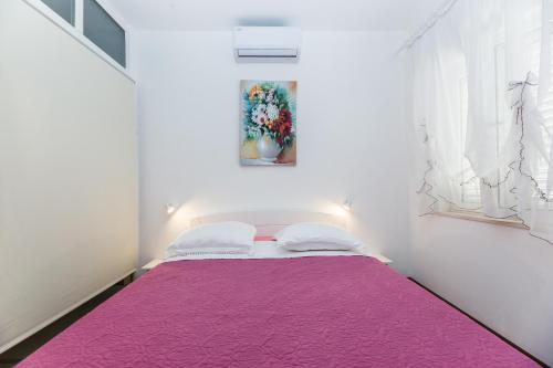 Posteľ alebo postele v izbe v ubytovaní Kastela Agneza Apartment (2+1) near SplitAirport
