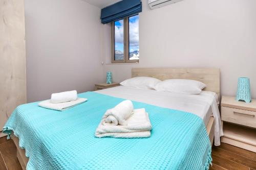 Ένα ή περισσότερα κρεβάτια σε δωμάτιο στο Timea Apartment