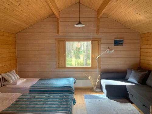 Cama o camas de una habitación en Tahkuna Puhkekeskus