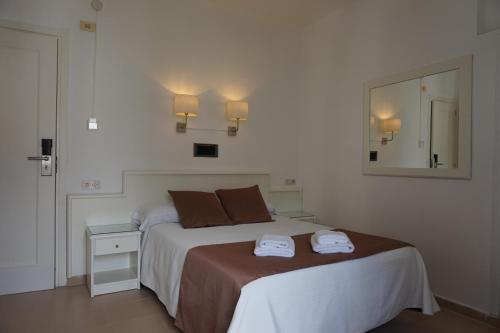 Hotel Hermesにあるベッド