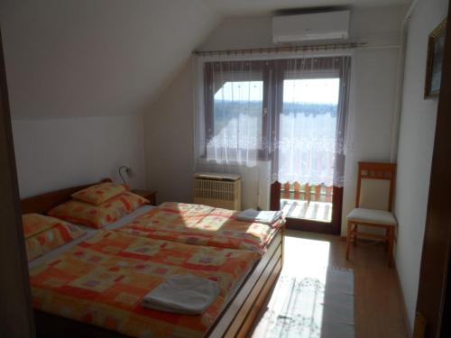 Ліжко або ліжка в номері Apartman Berki