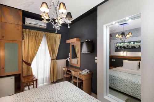 Postel nebo postele na pokoji v ubytování Hotel Segas