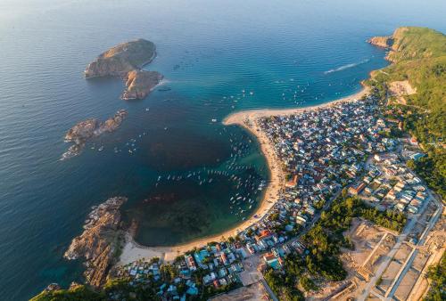 an aerial view of a small island in the ocean at Mira Eco Hotel Quy Nhơn in Quy Nhon