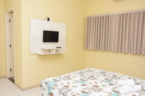 Posteľ alebo postele v izbe v ubytovaní HOTEL SANTA MARIA
