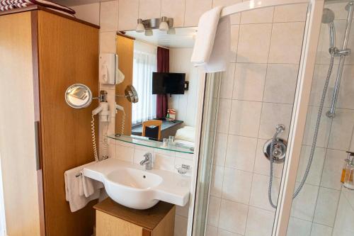 Salle de bains dans l'établissement Hotel Lucia - 3 Sterne Superior