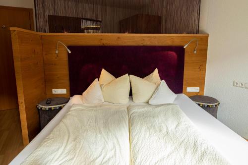 Un ou plusieurs lits dans un hébergement de l'établissement Hotel Lucia - 3 Sterne Superior