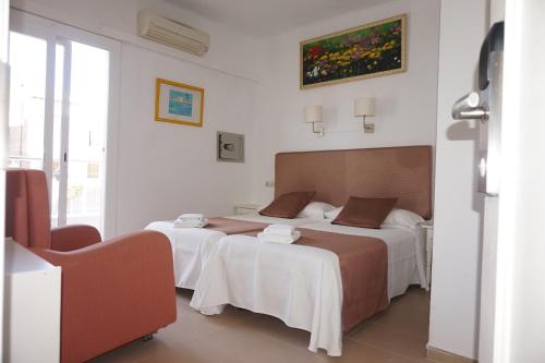 Hotel Hermesにあるベッド
