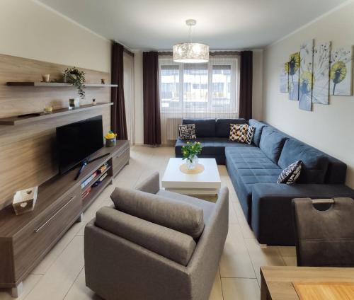 Ruang duduk di Holiday Apartman
