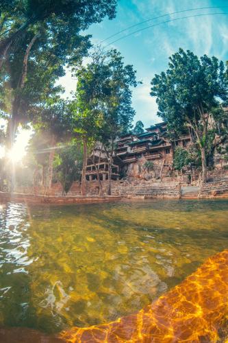 a view of the water in front of a building at Paraiso Caño Hondo in Los Guineos Perdidos