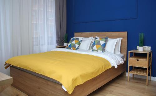 Ein Bett oder Betten in einem Zimmer der Unterkunft Parilament on Rustaveli 4 rooms