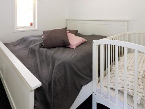 Ένα ή περισσότερα κρεβάτια σε δωμάτιο στο 10 person holiday home in Hadsund-By Traum