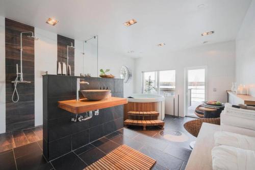 Гостиная зона в Guestly Homes - Luxury 9p Villa with 25 sqm Spa & Stunning Views