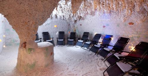 a group of chairs in a room covered in snow at Klostermann Wellness&Spa in Frymburk