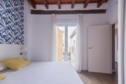 Giường trong phòng chung tại San Miguel, Luxury apartments.