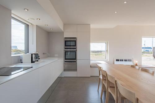 Kitchen o kitchenette sa North Vat by Bloom Stays