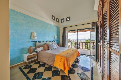 Postel nebo postele na pokoji v ubytování Sea Winds Lanzarote