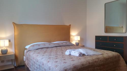 Postel nebo postele na pokoji v ubytování Al Numero 4