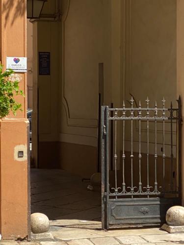 a metal gate in front of a building at Via Piave 82 in Cosenza