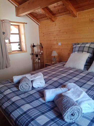Ένα ή περισσότερα κρεβάτια σε δωμάτιο στο Chalet Mariabel Vue panoramique