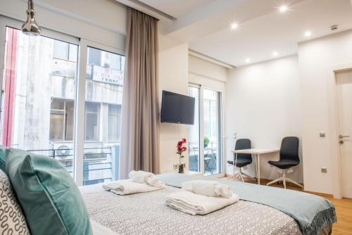 Posteľ alebo postele v izbe v ubytovaní A25 Pristine & Sunny flat with balcony at downtown Athens