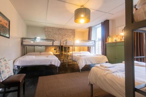 Кровать или кровати в номере Georgian Loft Apartment