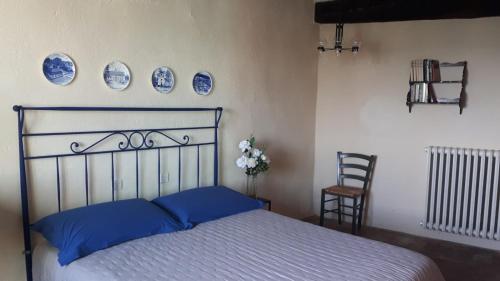 A bed or beds in a room at Residenza Monastero de' Medici