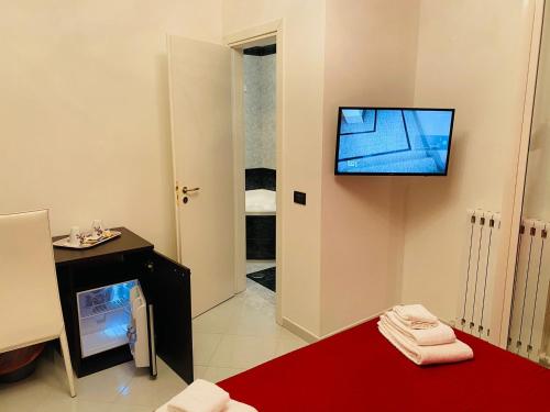 B e B Le Terrazze sul mareにあるテレビまたはエンターテインメントセンター