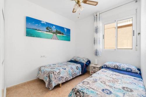 Posteľ alebo postele v izbe v ubytovaní Villa-Capricho Playa - Zeus