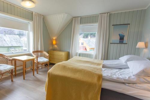 En eller flere senge i et værelse på Raaehuset