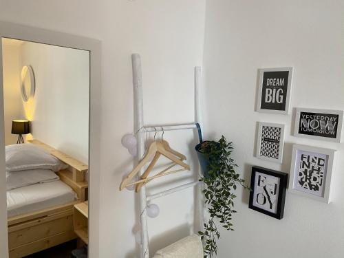a bedroom with a mirror and a bed at Pensiunea Bradet - Padis in Padis