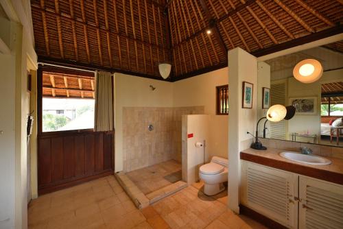Koupelna v ubytování Bebek Cottages Sanur