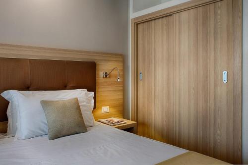 Letto o letti in una camera di American Hotel