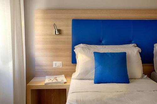 Letto o letti in una camera di American Hotel