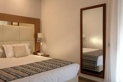 Letto o letti in una camera di American Hotel
