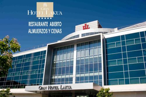 an office building with the sign for the hotel laounge at Gran Hotel Lakua in Vitoria-Gasteiz