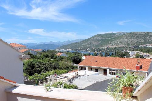 a view from the balcony of a house at Apartments Ira in Dubrovnik
